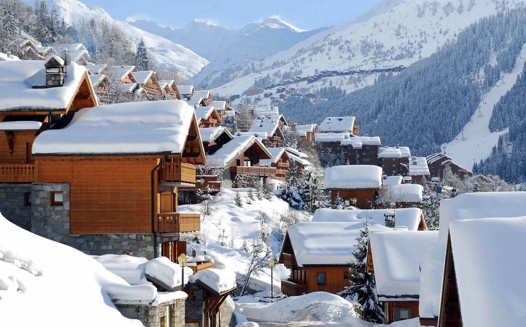 Snow-covered chalets in an alpine village